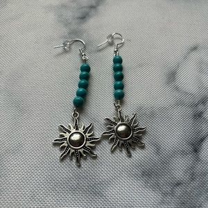 Silver sun earrings with turquoise beads